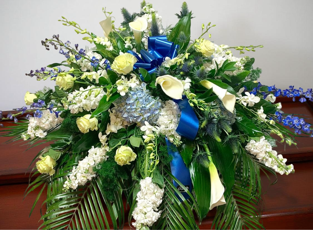 Heavenly Blue Tribute Casket Spray