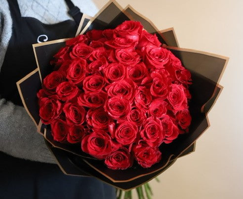 Wrapped Red Roses