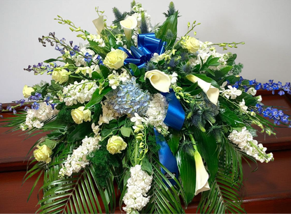 Heavenly Blue Tribute Casket Spray