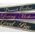 Funeral tribute ribbons featuring scripted messages reading “Dearest Brother,” “Loving Mother,” and “Good Bye,” displayed in elegant gold lettering on black and purple satin ribbons against a light background.
